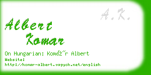 albert komar business card